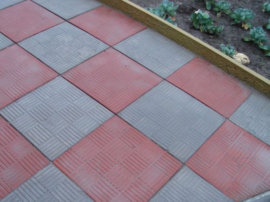 Тротуарная плитка красная елочкой фото