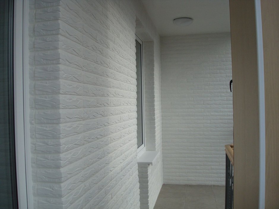 Отделка пилона декоративным кирпичом