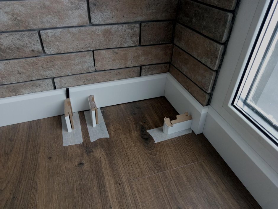 Ламинат на пороге балкона