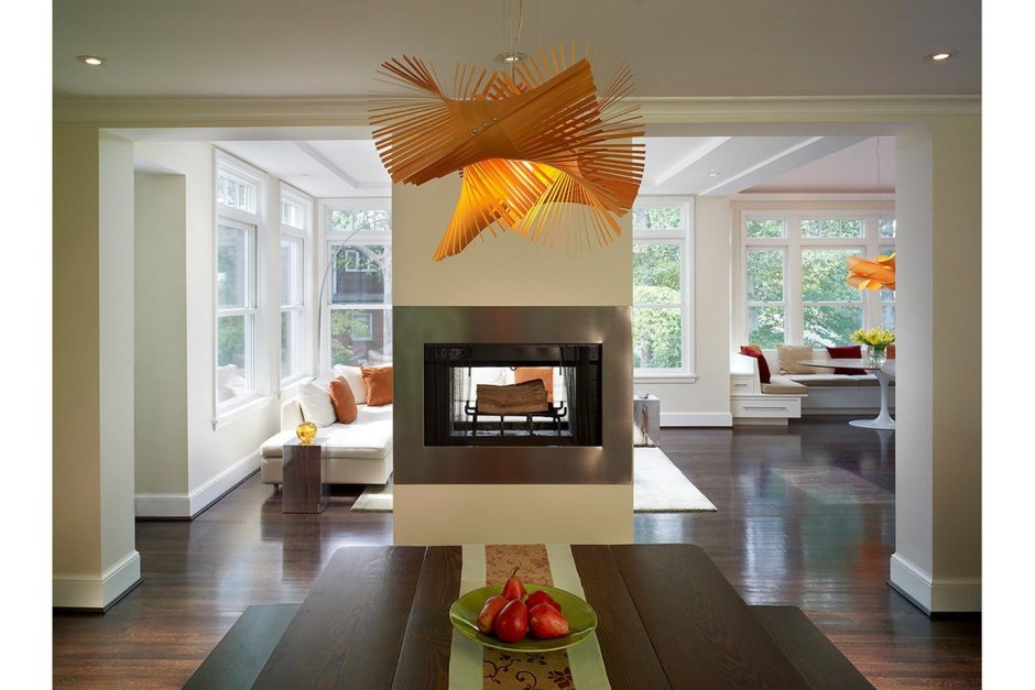 Биокамин в интерьере гостиной лофт