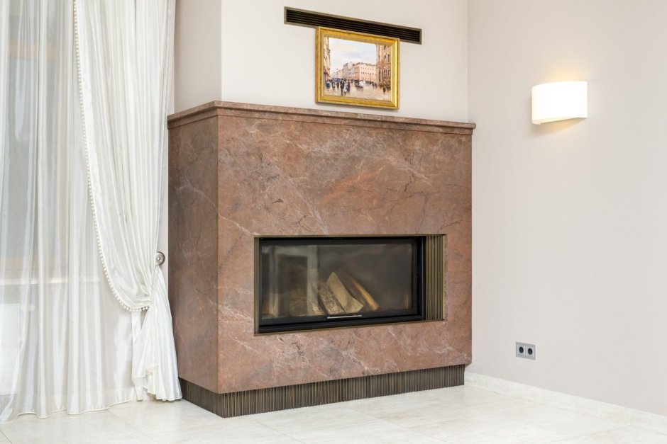 Облицовка камина плиткой