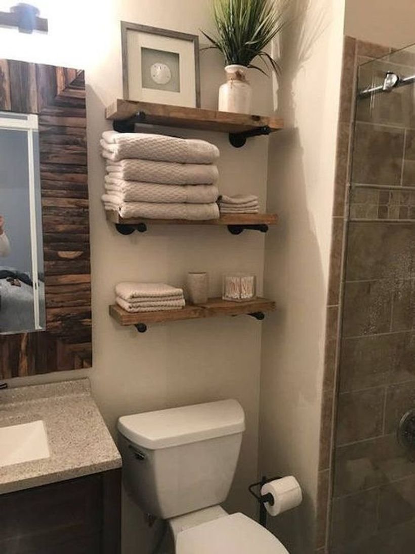 Электрический полотенцесушитель над ванной