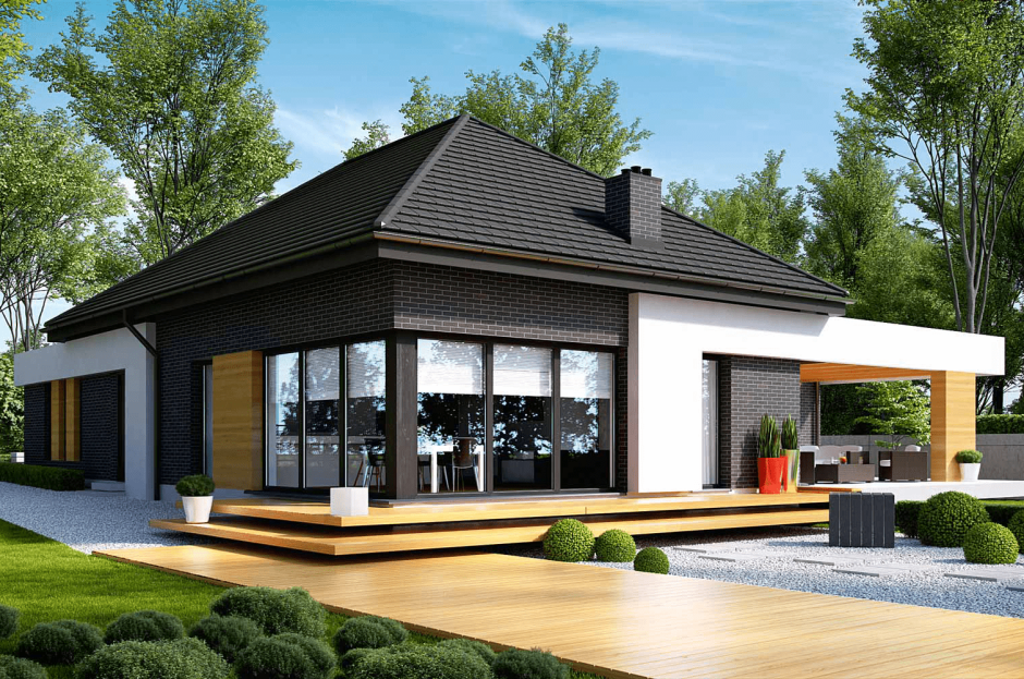Одноэтажный дом с большими окнами и террасой
