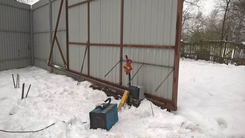 Защита откатных ворот от снега