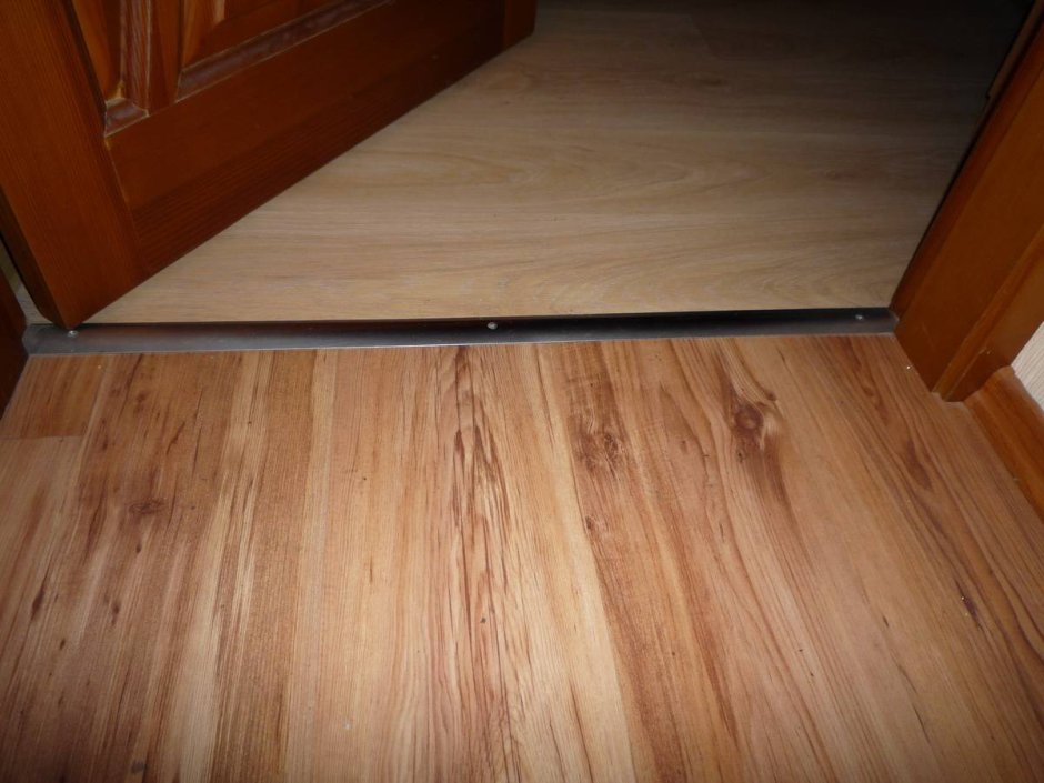 Пороги между комнатами с перепадом