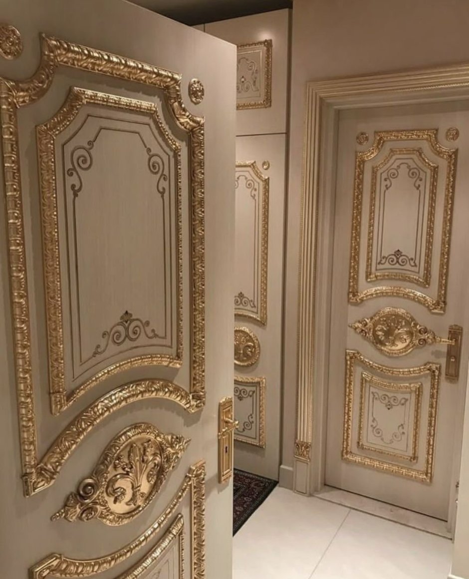 Двери межкомнатные белые с золотом