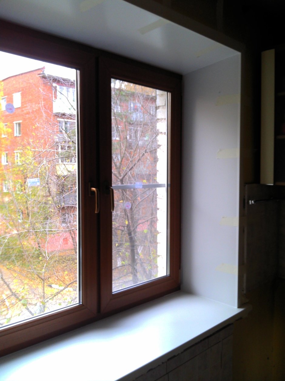 Коричневые пластиковые окна
