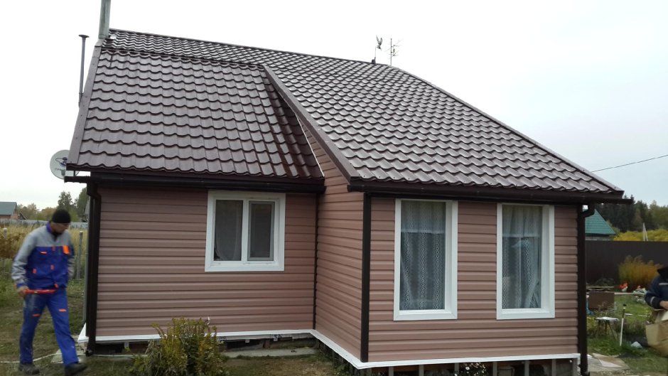 Дачный дом обшитый сайдингом