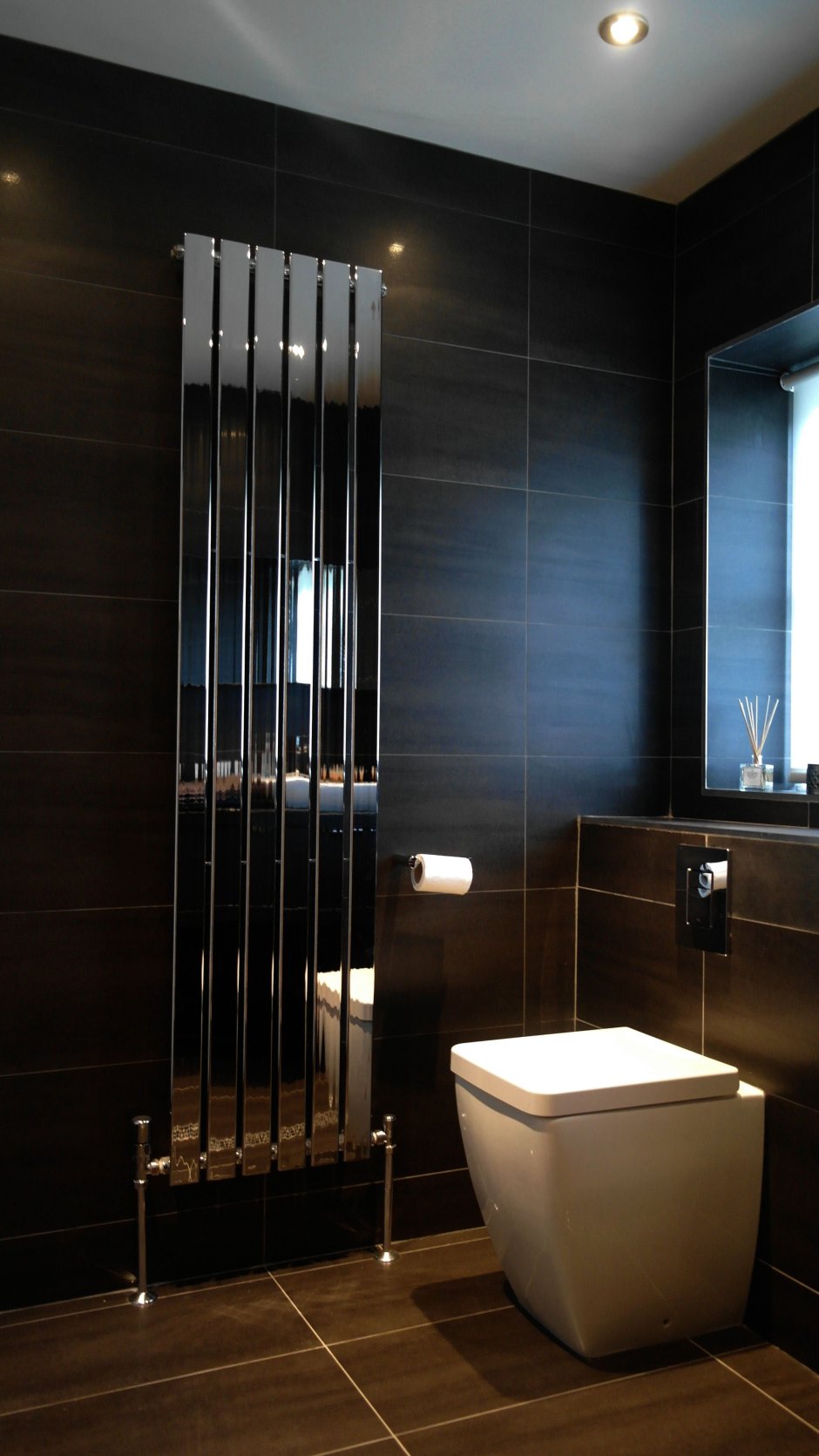 Полотенцесушитель над раковиной