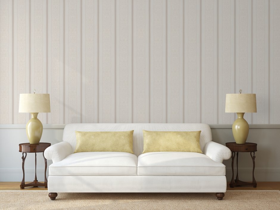 Черно-белые постеры над диваном