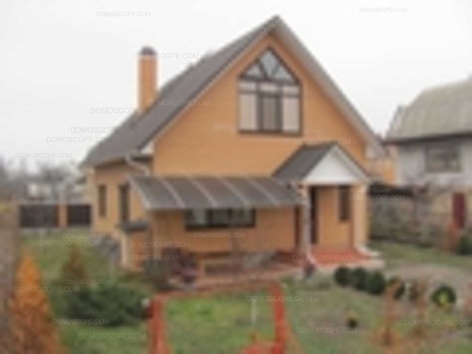 Частный кирпичный дом в деревне