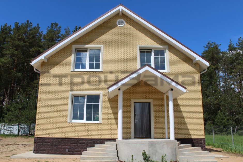 Дом из белого кирпича