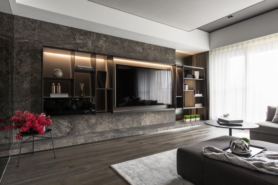 Керамогранит в зоне ТВ В гостиной