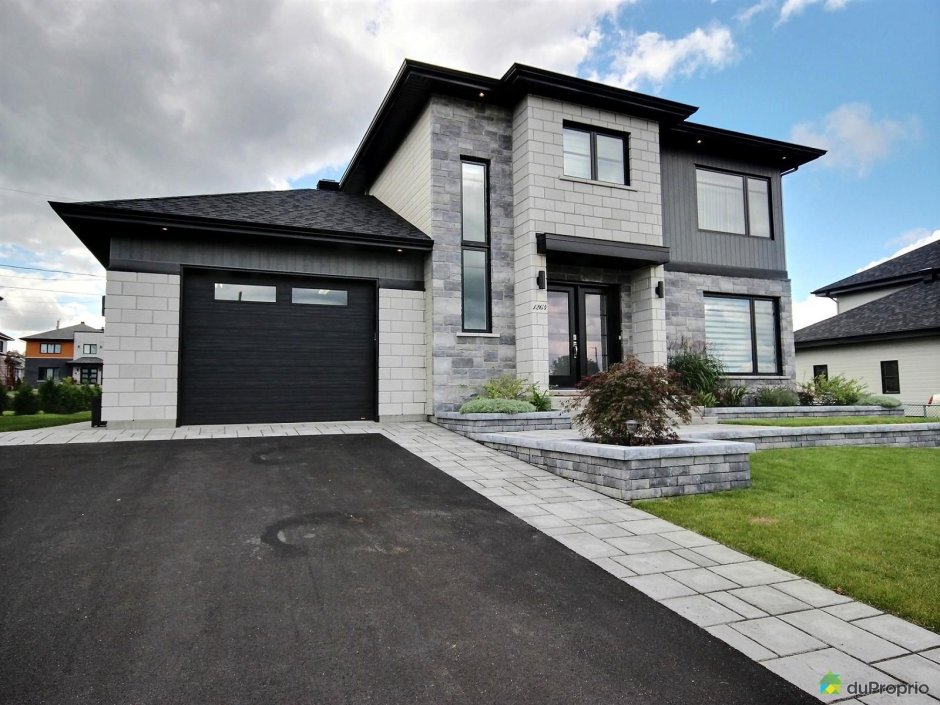 Коттедж из серого кирпича