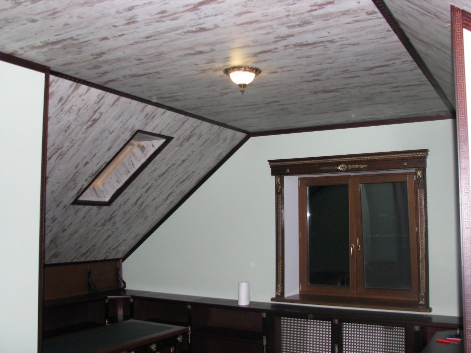 Отделка стен мансарды