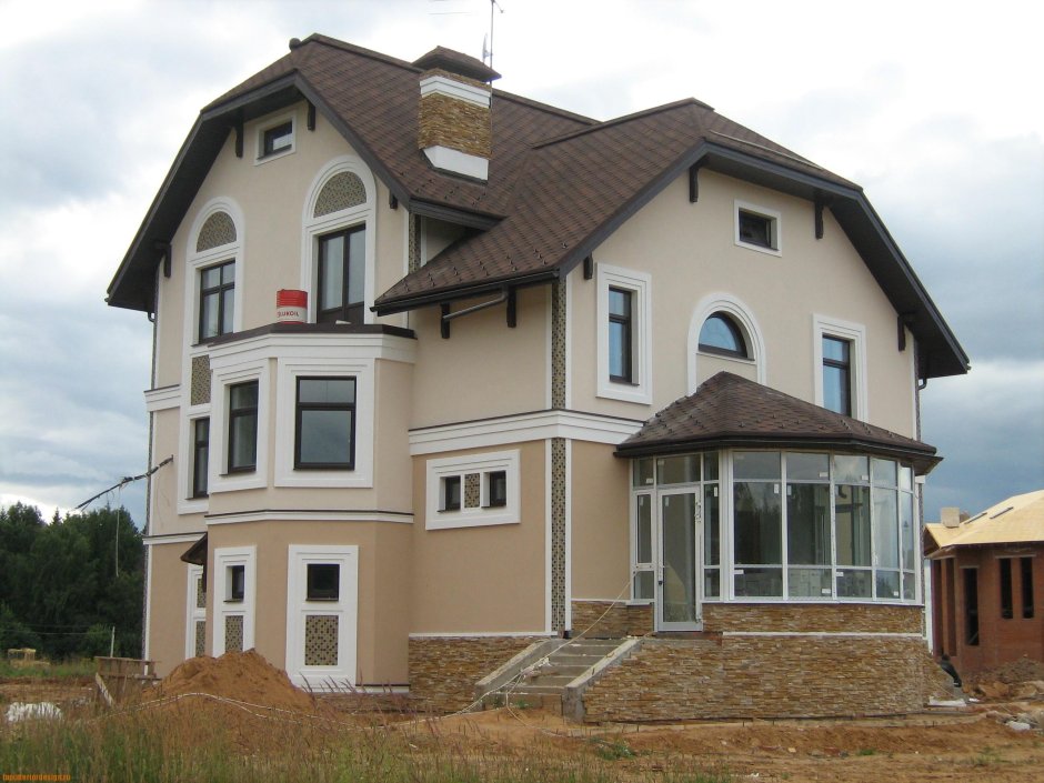 Фасады домов из штукатурки