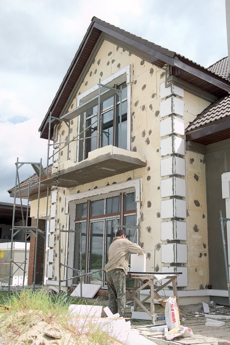 Мокрая штукатурка фасада