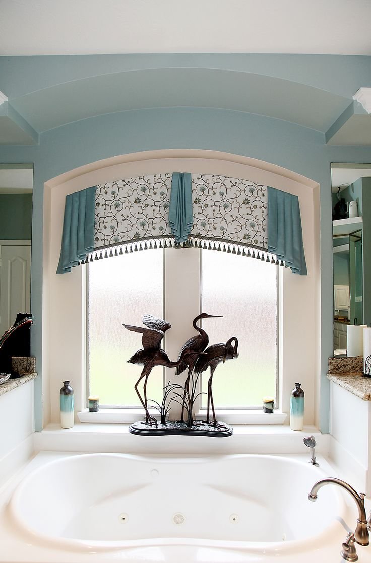 Эркер с арочными окнами