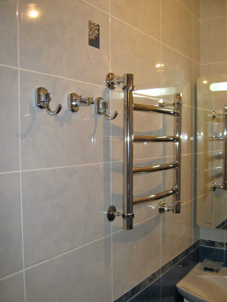 Полотенцесушитель над унитазом высота