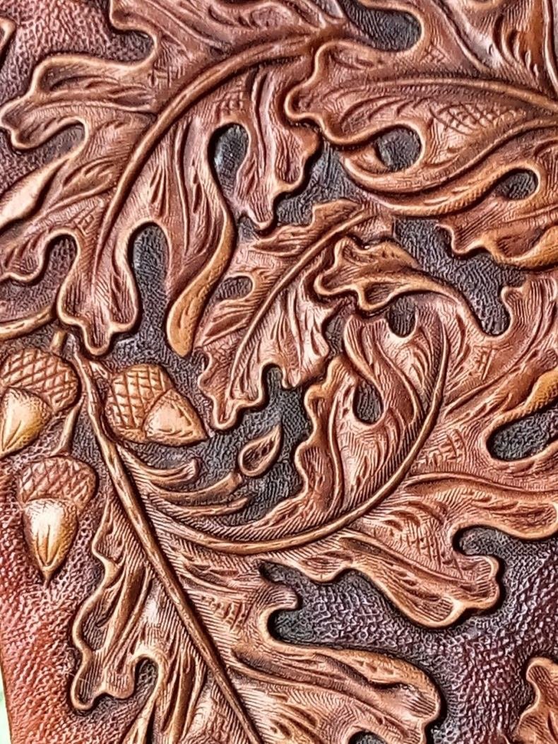 Тиснение на коже дерево