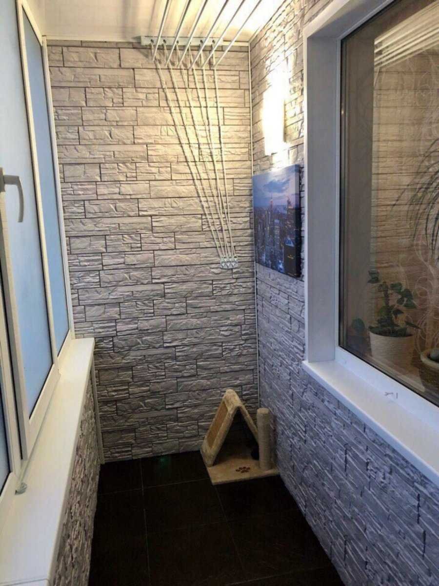 Отделка балкона камнем