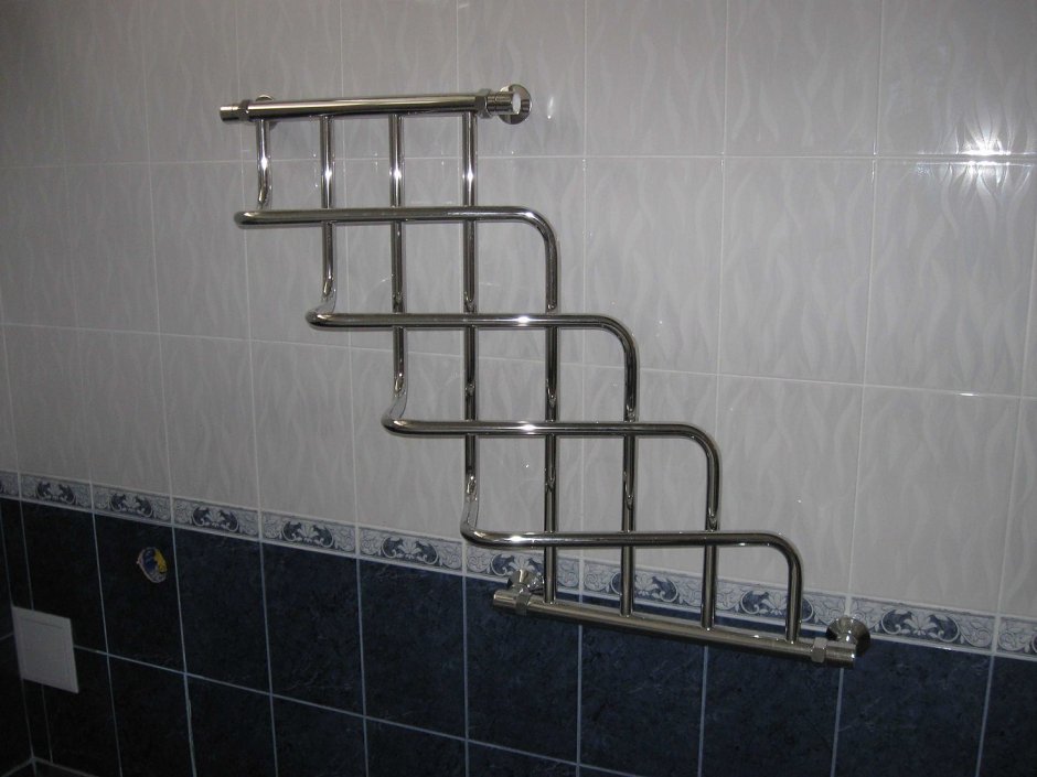 Полотенцесушитель над раковиной