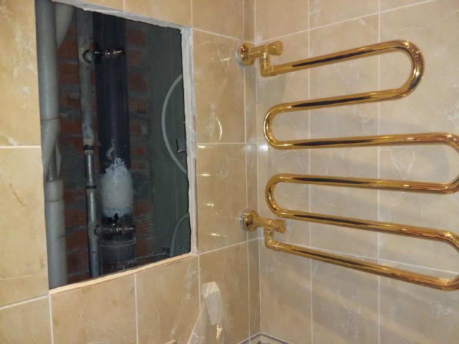 Полотенцесушитель над раковиной