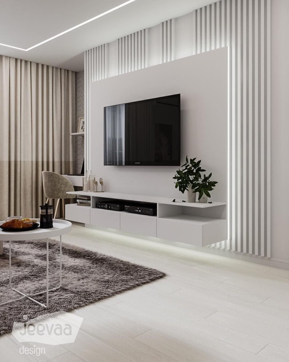 Телевизор на рейках в гостиной