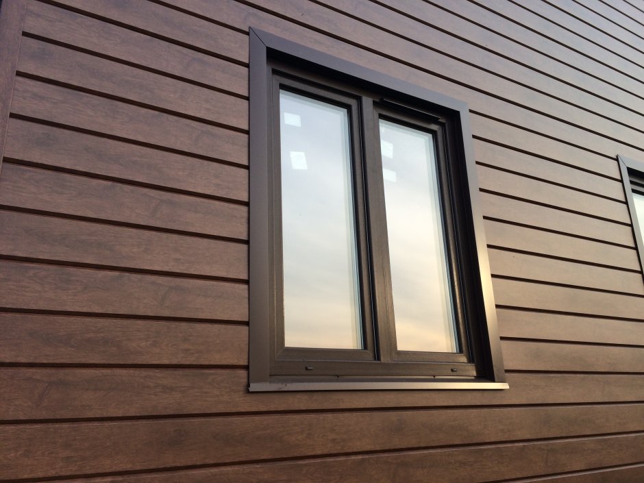 Планкен и камень на фасаде