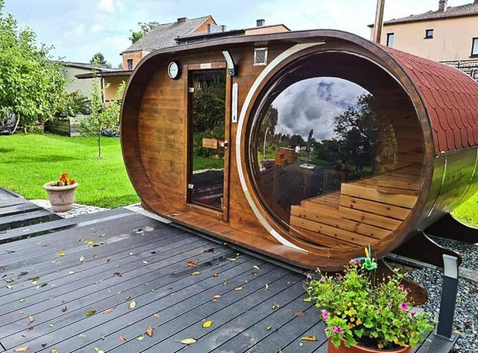 Овальная баня бочка с панорамным окном