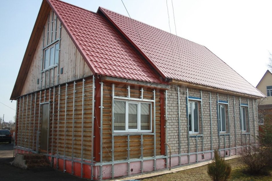 Обшить дом металлопрофилем