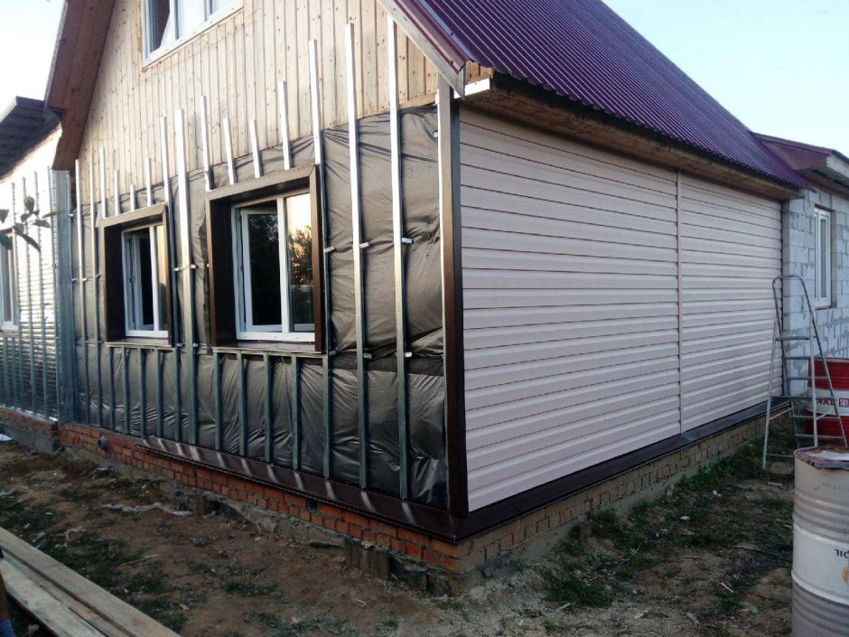 Обшивка домов профнастилом