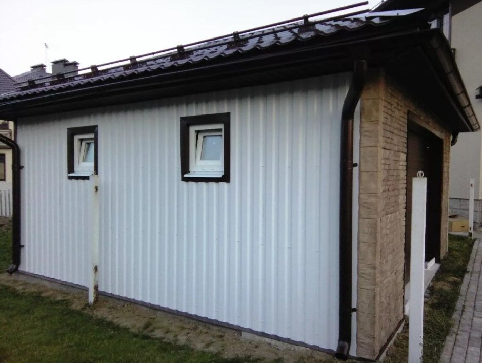 Дом обшитый профлистом