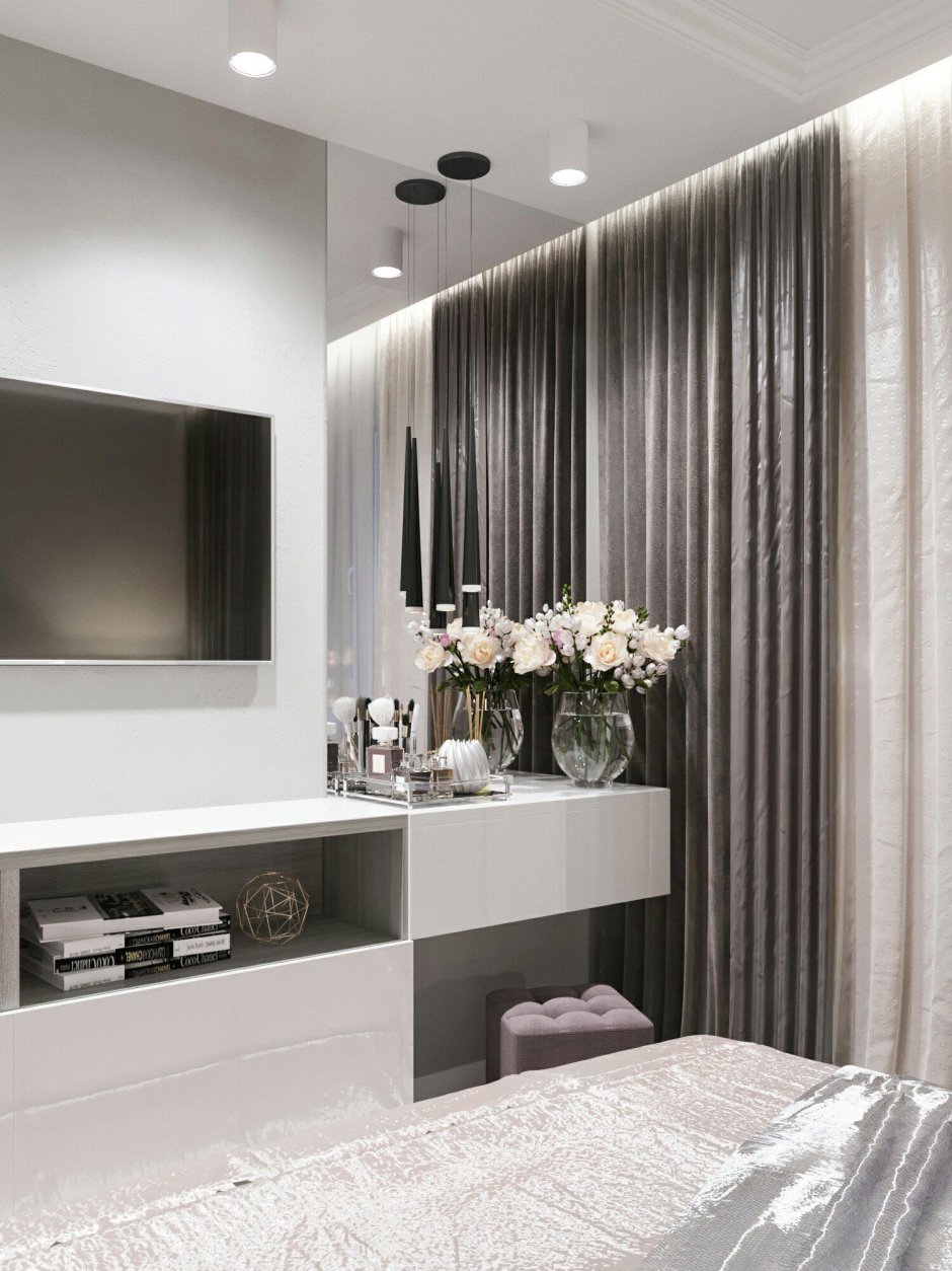 ТВ зона в спальне с туалетным столиком