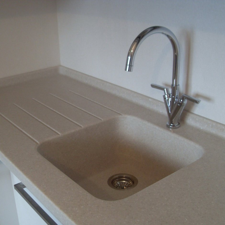 Влитая мойка из искусственного камня