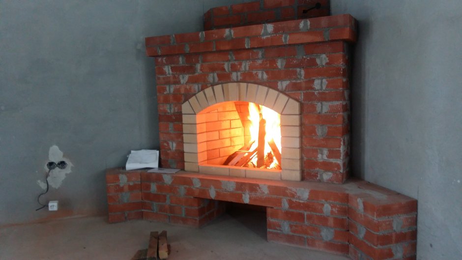 Кладка камина с обогревателем