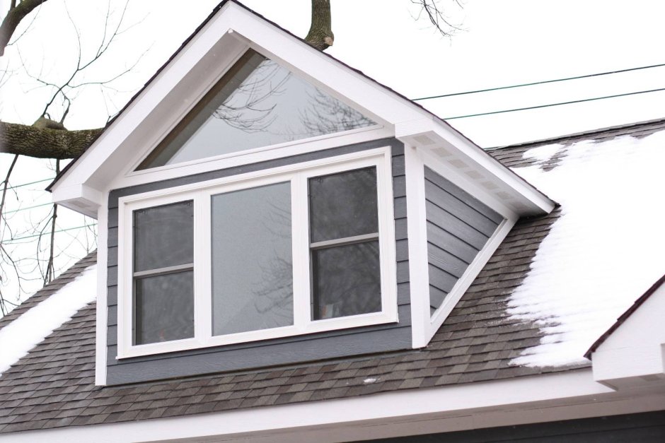 Слуховое окно на крыше Дормер