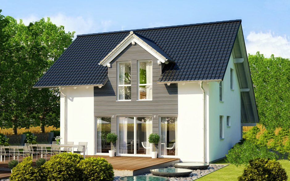 Красивый дом с двускатной крышей