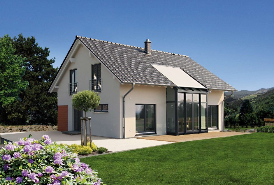 Дом с двускатной крышей и гаражом