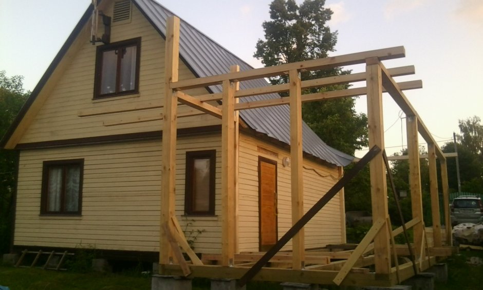 Пристрой к каркасному дому с крышей