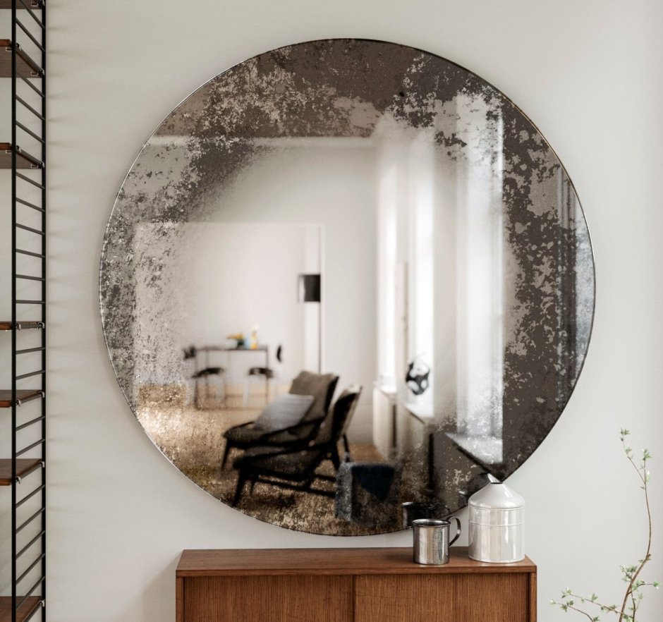 Зеркало в металлической раме