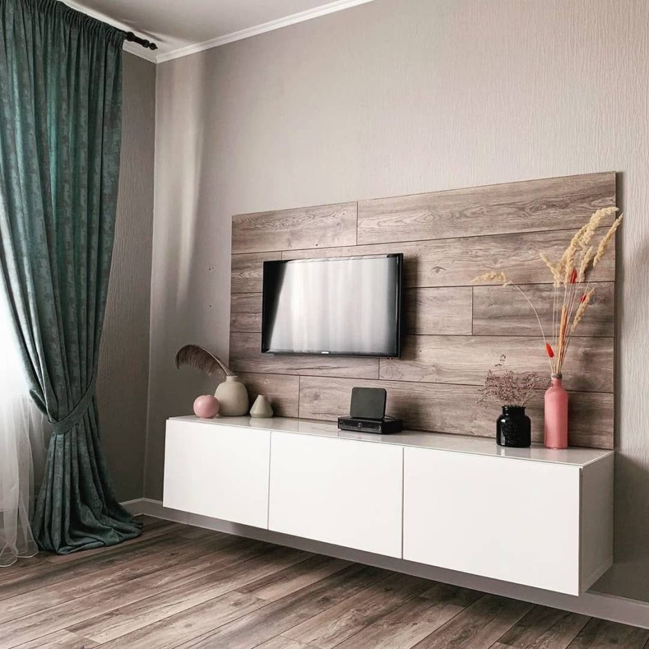 Ламинат на стену в гостиной