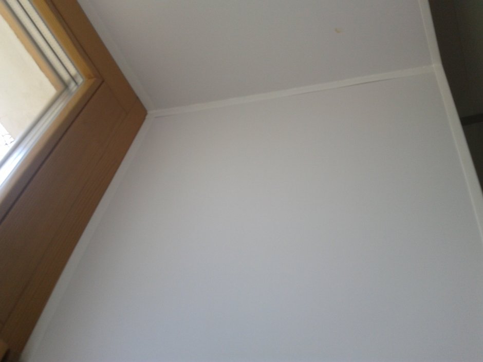 Декоративная штукатурка на оконных откосах