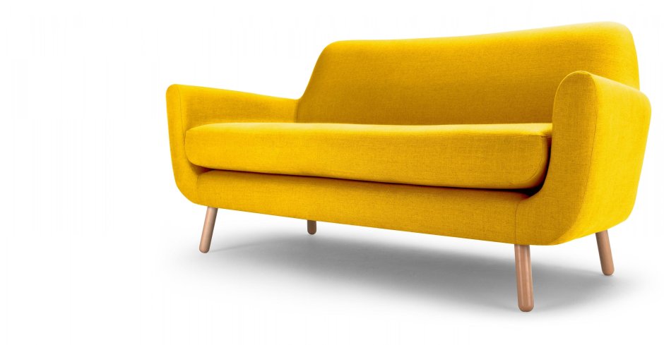 Желтый диван на темном фоне