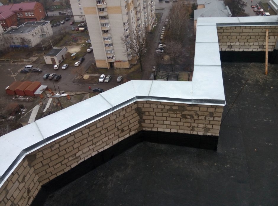 Кирпичная кладка парапета