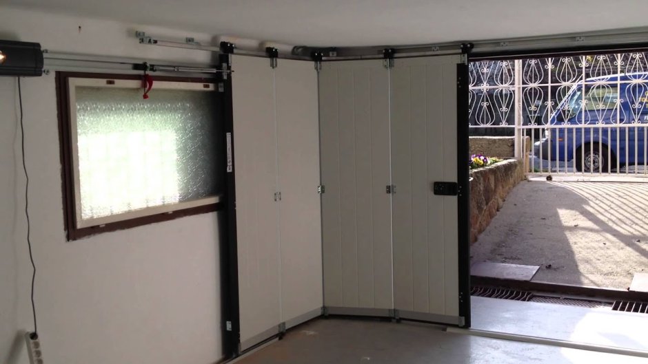 Откатные секционные ворота HST