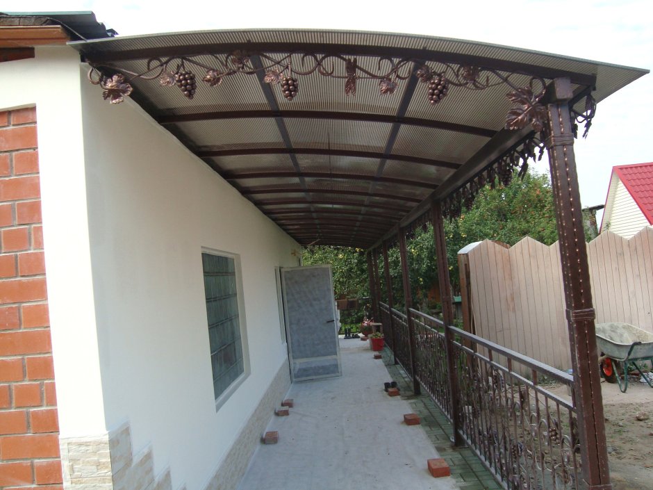 Кованый навес к дому