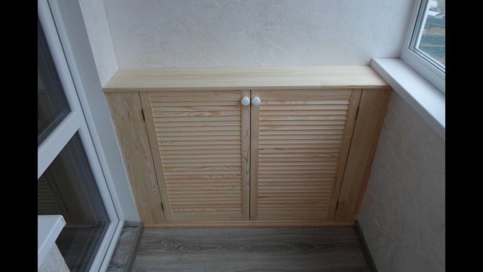 Жалюзийные двери на балконе