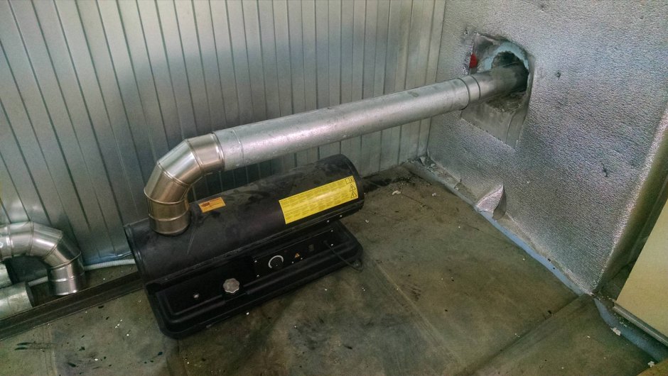 Печка с водяным контуром для отопления гаража