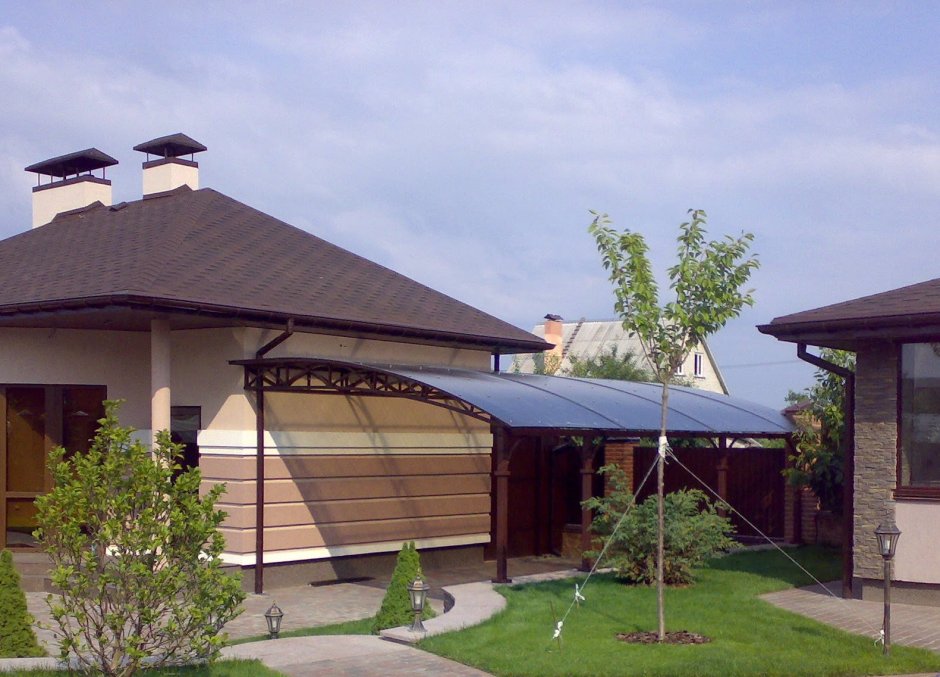 Одноэтажный дом с навесом для авто